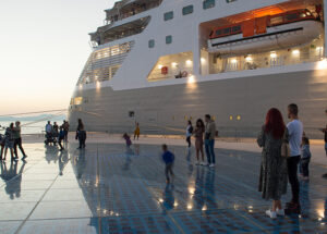 Zadar, Croatia - 30 October 2022: Cruise ship by the touristic attraction Greetings to the sun where families enjoy with their children